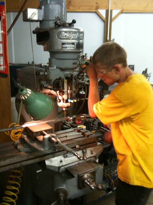 Dan working on jeweling Jimmy's rifle.
