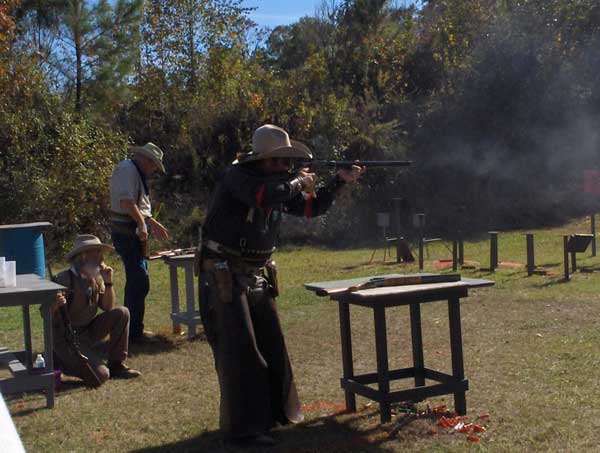 Red River Ray shooting his Cowboy Gunworks '73 rifle and a pair of Jimmy Spurs Best Rugers with full race action jobs!