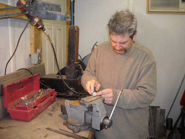 Jimmy doing some final touches on a 1873 part.