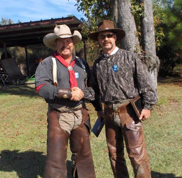 2009 SASS NC State Championships Top Gun Jimmy Spurs being congratulated by his friend, Red River Ray.