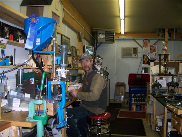 At the workbench.