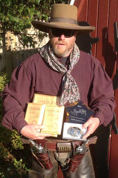 Illustrated Man - top male at 2012 SASS Long Island Championship 'Melee on the Bay'.  'Garnet Gal' was the top lady shooter.  Both shoot Cowboy Gunworks firearms and are good friends of mine.